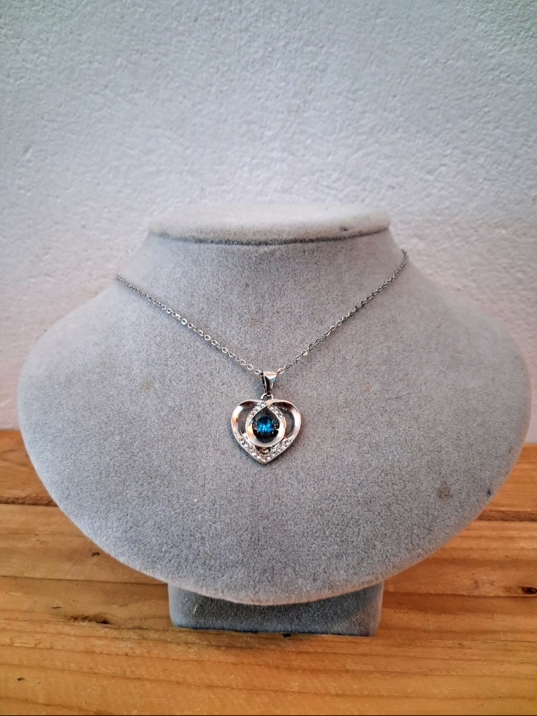 Silver heart blue stone pendant